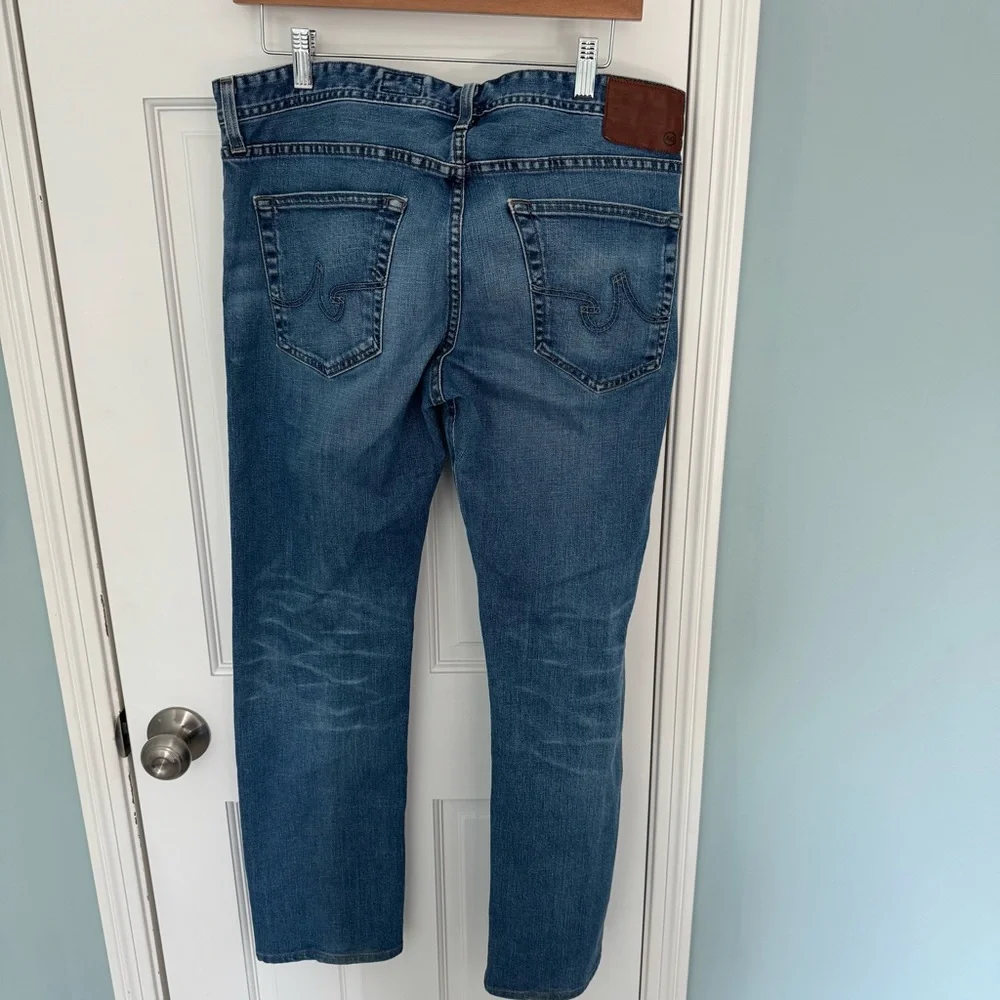 AG Adriano Goldschmied light wash mens blue jeans 34